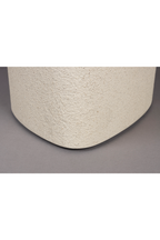 Table d'appoint beige aux formes organiques