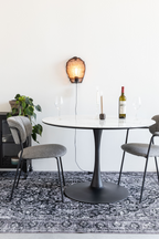Table de salle à manger à pied central avec finition marbre